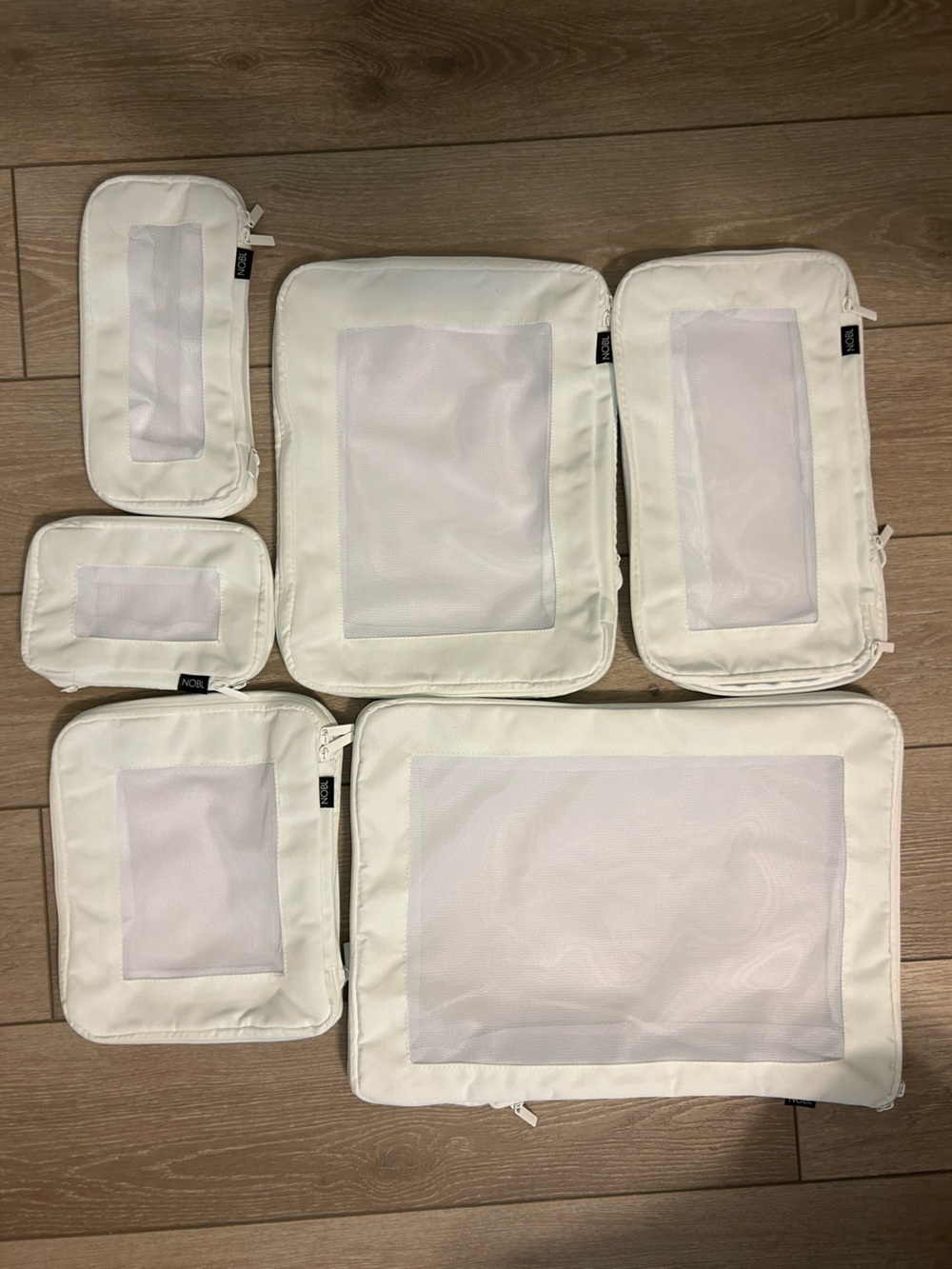 NWOT NOBL 6-Piece White Compressible Packing Cube Set for Travel & Organization